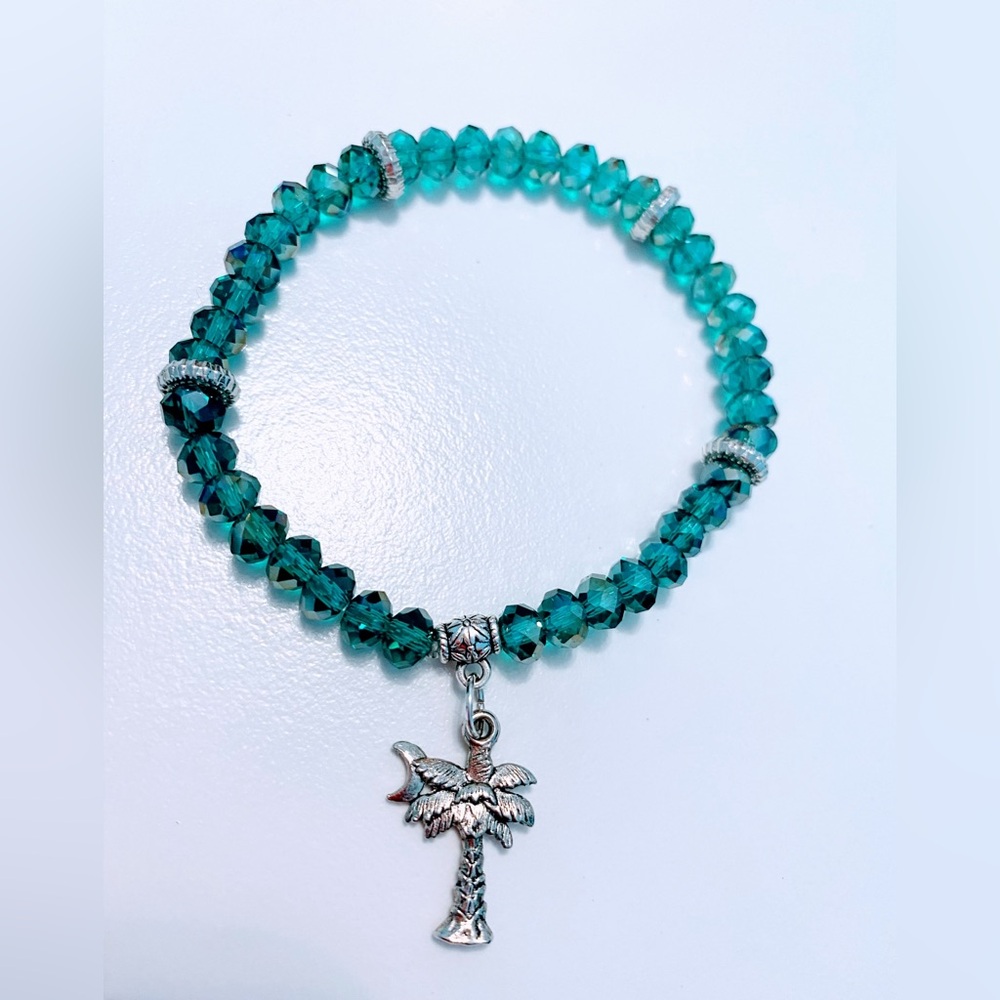 Elegant Silver and Green Crystal Beaded Bracelet with Palm Tree charm